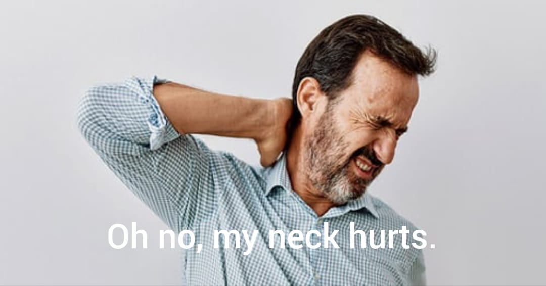 Man that has neck that hurts him. His neckhurts.